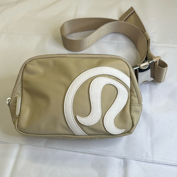 lululemon athletica Handbags - Lululemon Everywhere Belt Bag in Trench/White